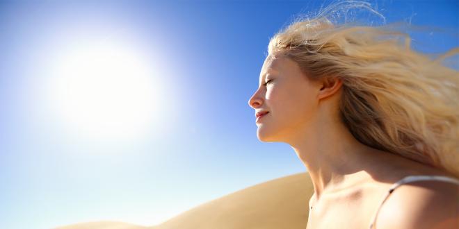 A woman in the desert heat, with beautiful youthful skin